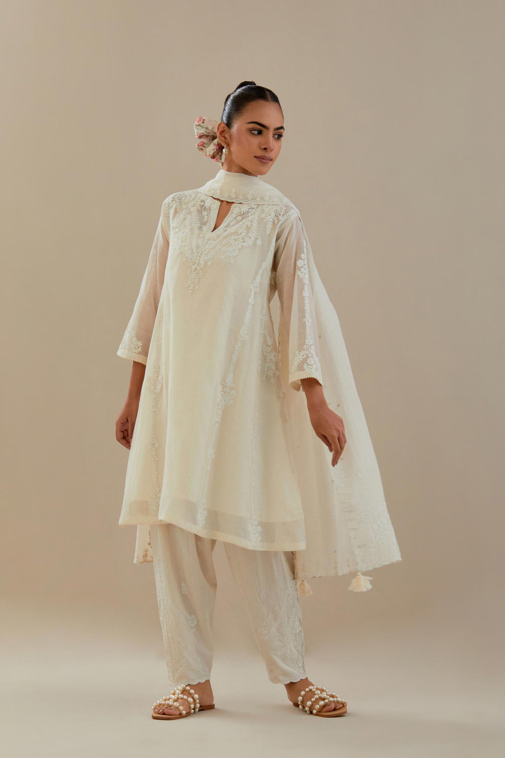 Off white cotton chanderi easy fit short kalidar kurta set with off white dori embroidery.