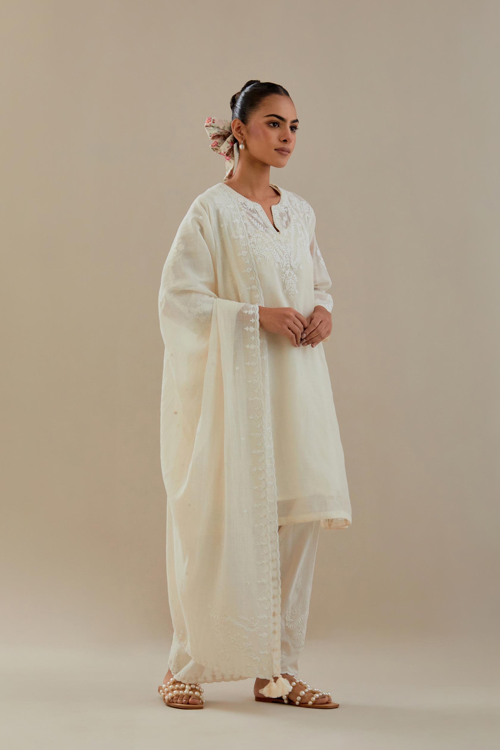 Off white cotton chanderi dupatta with all-over thread & edges are finished with dori embroidery, highlighted with sequins work.