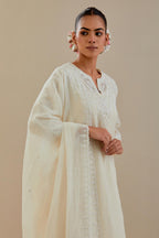 Off white cotton chanderi straight short kurta set with all-over off white dori embroidery.