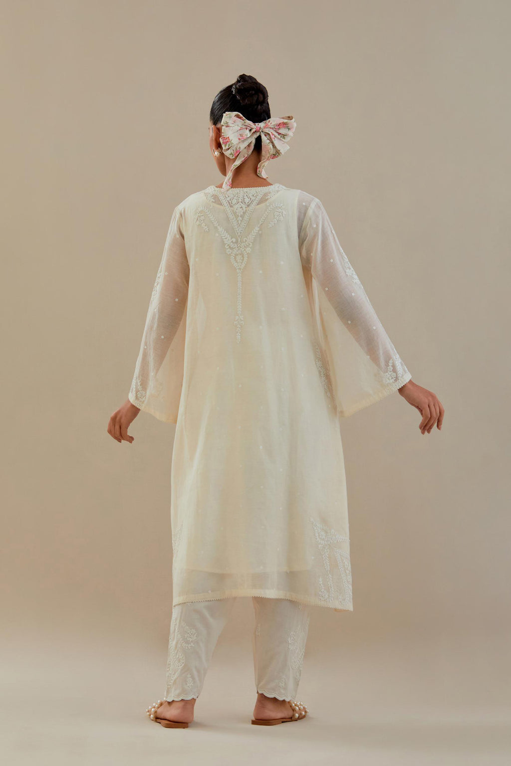 Off white cotton chanderi A-line kurta set highlighted with off white dori embroidery.