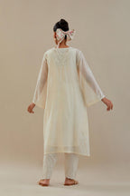 Off white cotton chanderi A-line kurta set highlighted with off white dori embroidery.