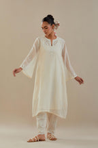 Off white cotton chanderi A-line kurta set highlighted with off white dori embroidery.