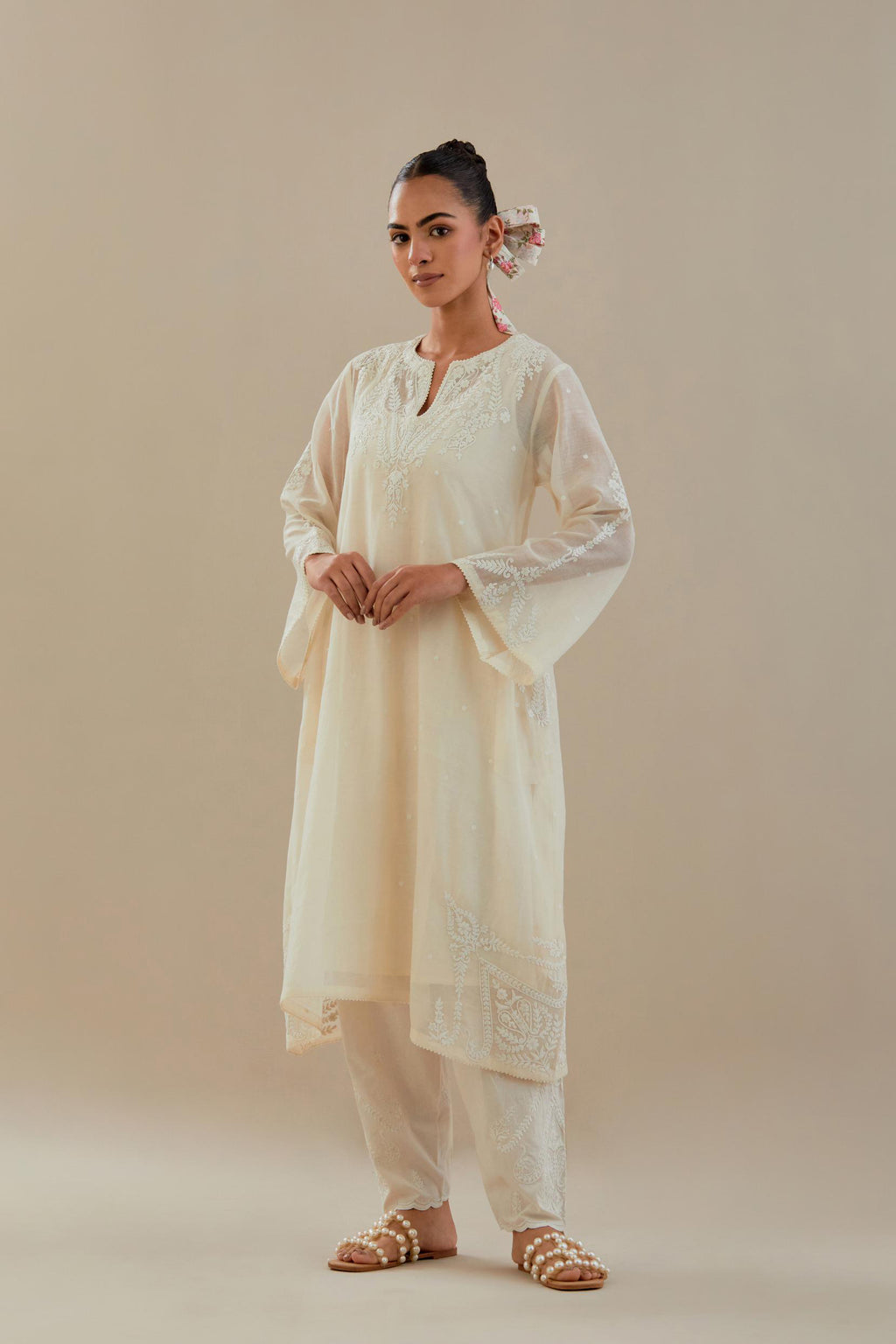 Off white cotton chanderi A-line kurta set highlighted with off white dori embroidery.