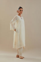 Off white cotton chanderi A-line kurta set highlighted with off white dori embroidery.