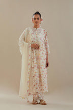 Off white cotton chanderi Kurta set dress with all-over small multi colored hand block print, highlighted with applique embroidery and ricrac lace.