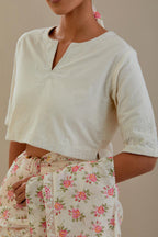 Off-white cotton blouse with thread embroidery & bead work.