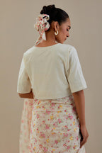 Off-white cotton blouse with thread embroidery & bead work.