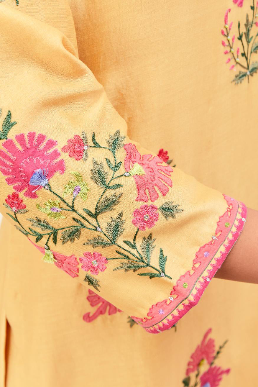 Yellow silk chanderi straight kurta set with all-randomly placed appliqued assorted bootas, highlighted with aari threadwork & sequins.