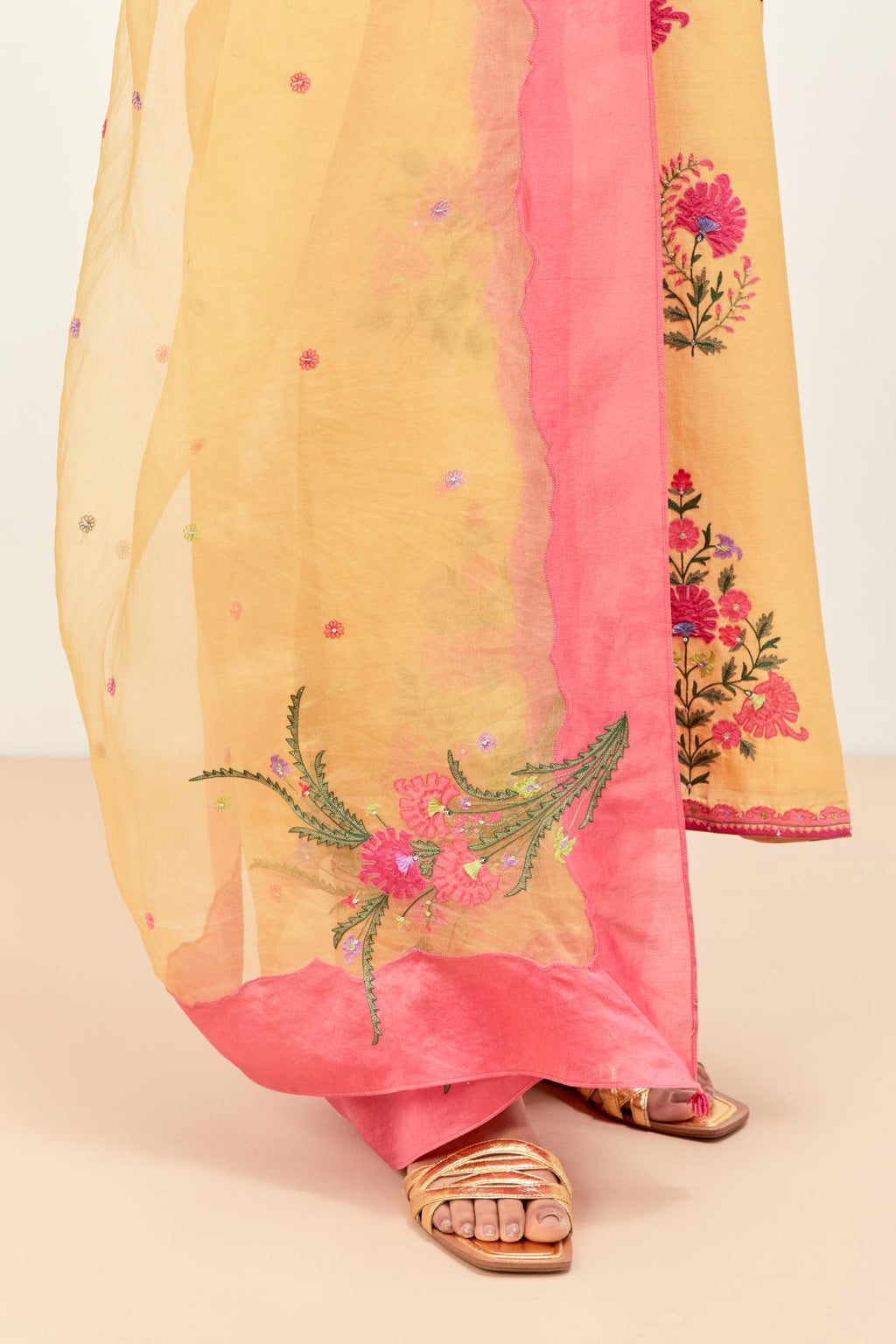 Yellow & pink silk organza narrow dupatta, highlighted with all-over delicate thread flower and applique floral boota at all four corners.