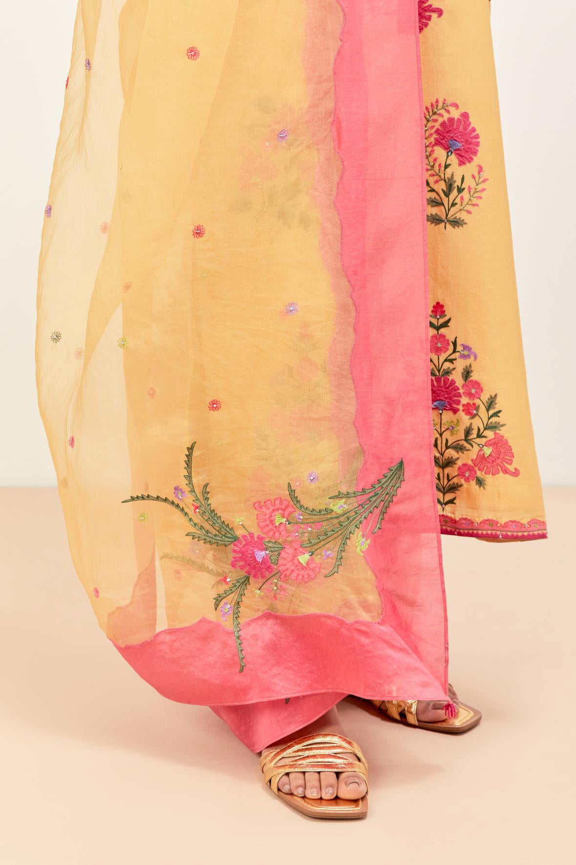 Yellow silk chanderi straight kurta set with all-randomly placed appliqued assorted bootas, highlighted with aari threadwork & sequins.