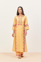 Yellow silk chanderi straight kurta set, decorated with appliqué borders along the side panels, neck and sleeves.