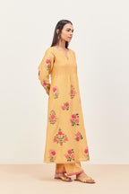 Yellow silk chanderi kurta set with pin tucks at yoke and all-over applique, highlighted with aari threadwork & sequins.