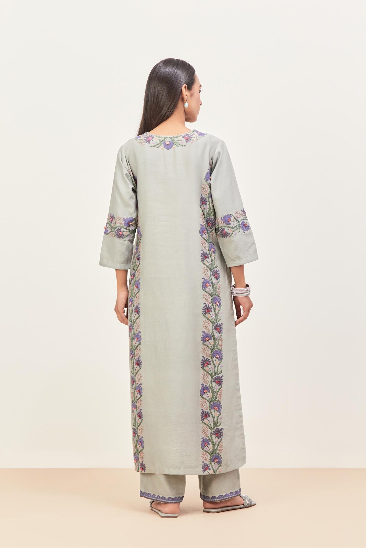 Bluish Grey silk chanderi straight kurta set, decorated with appliqué borders along the side panels, neck and sleeves.