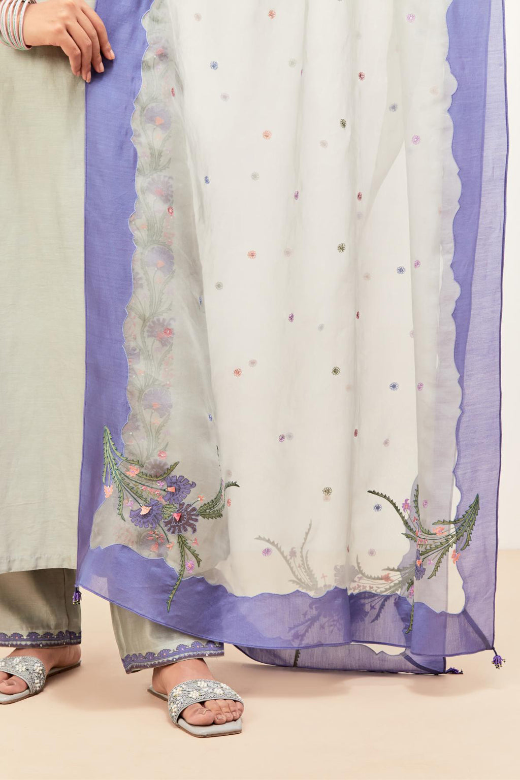 Bluish Grey silk chanderi kurta set with pin tucks in the front & back and floral applique boota at sides, highlighted with aari threadwork & sequins.
