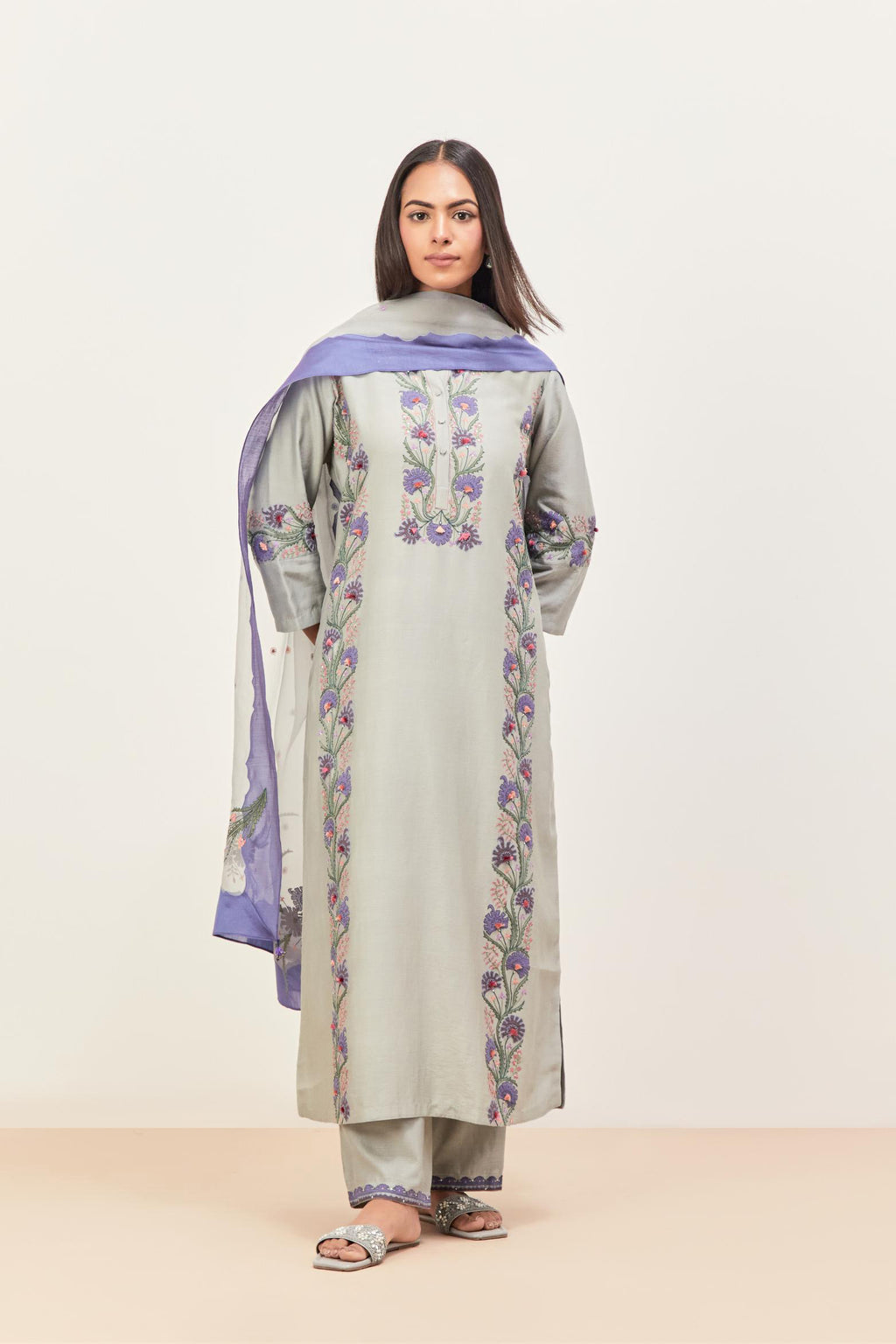 Bluish Grey silk chanderi straight kurta set, decorated with appliqué borders along the side panels, neck and sleeves.