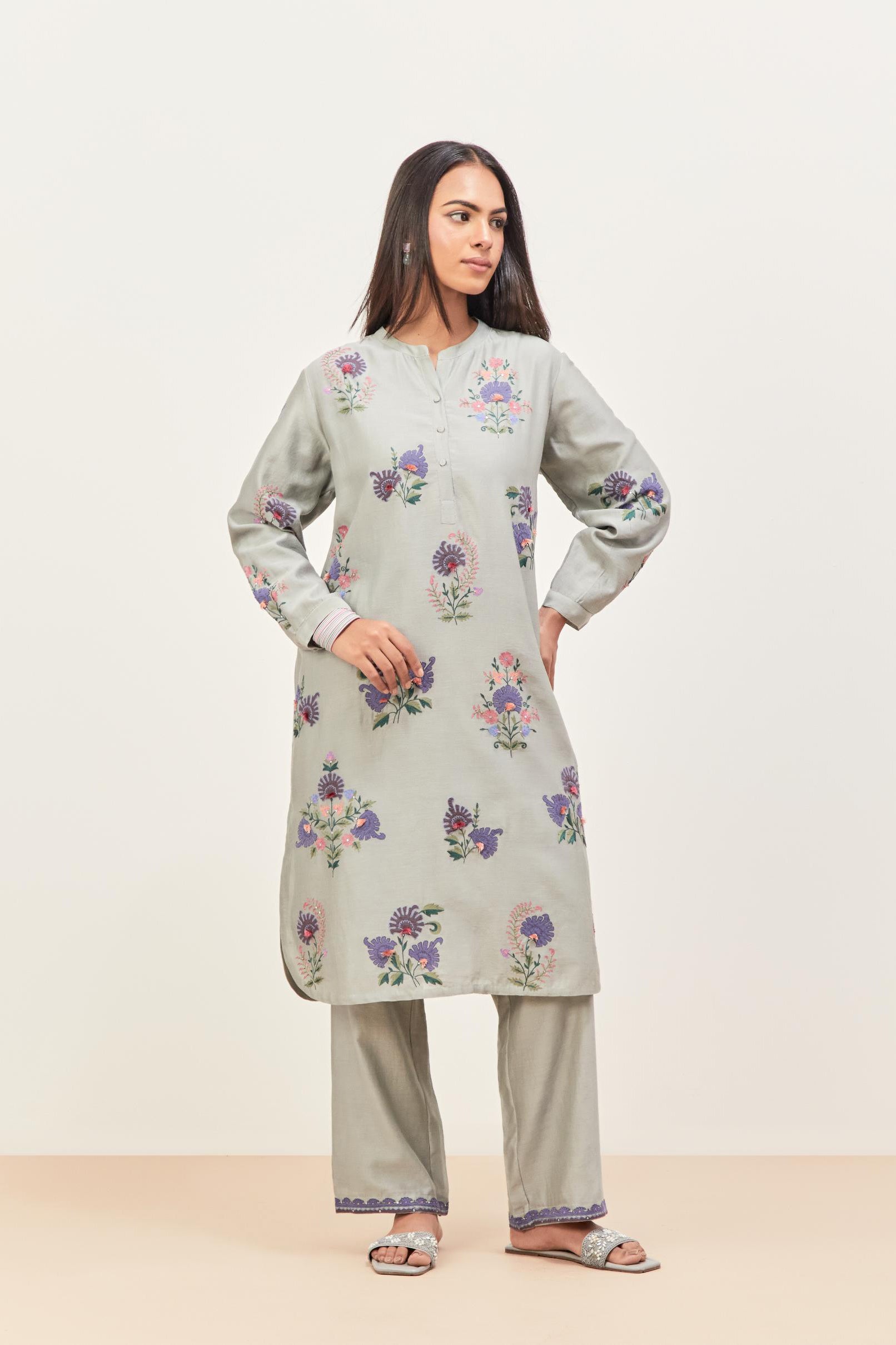Bluish Grey silk chanderi straight short easy fit kurta set with all-over assorted flower applique, highlighted with aari threadwork & sequins.