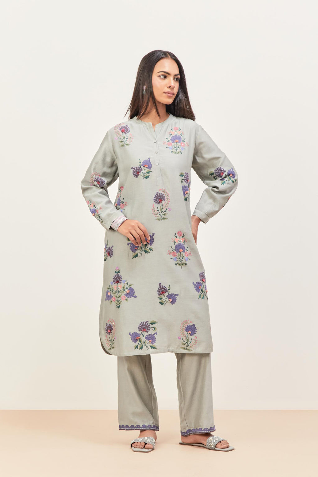 Bluish Grey silk chanderi straight short easy fit kurta set with all-over assorted flower applique, highlighted with aari threadwork & sequins.
