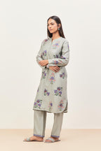 Bluish Grey silk chanderi straight short easy fit kurta set with all-over assorted flower applique, highlighted with aari threadwork & sequins.