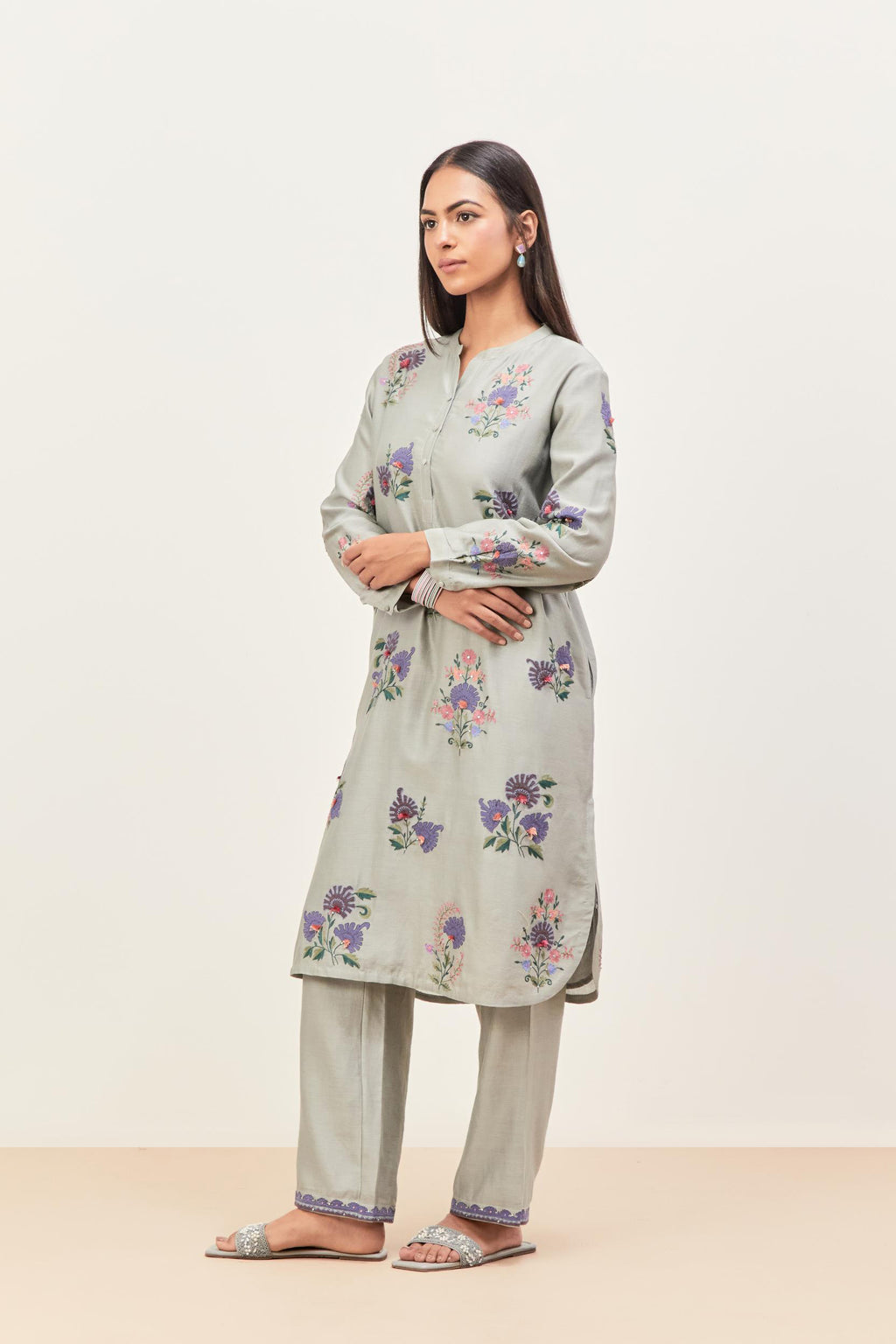 Bluish Grey silk chanderi straight short easy fit kurta set with all-over assorted flower applique, highlighted with aari threadwork & sequins.