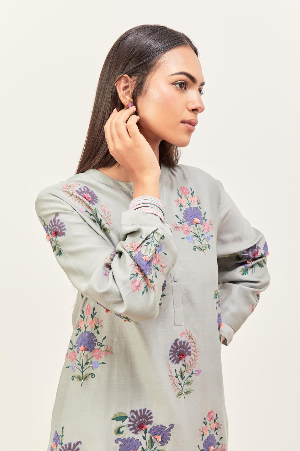 Bluish Grey silk chanderi straight short easy fit kurta set with all-over assorted flower applique, highlighted with aari threadwork & sequins.