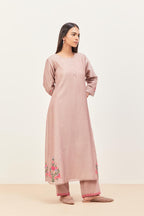 Lilac silk chanderi kurta set with pin tucks in the front & back and floral applique boota at sides, highlighted with aari threadwork & sequins.
