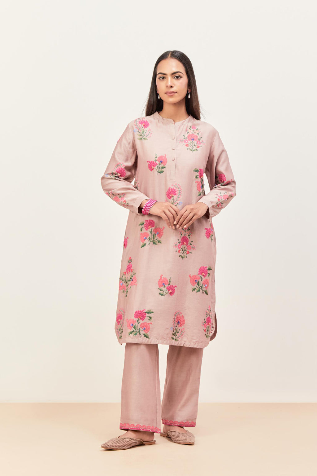 Lilac silk chanderi straight short easy fit kurta set with all-over assorted flower applique, highlighted with aari threadwork & sequins.