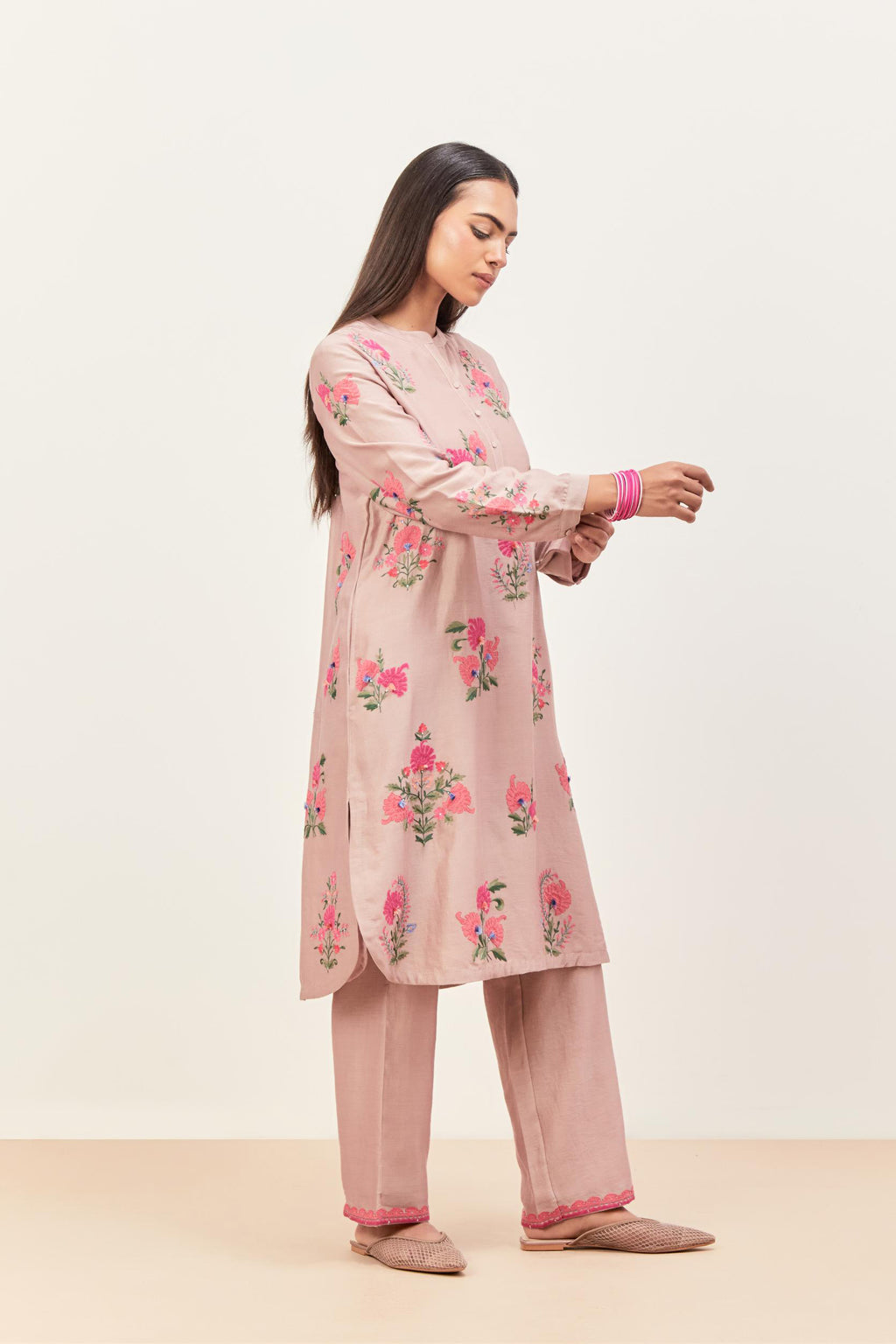 Lilac silk chanderi straight short easy fit kurta set with all-over assorted flower applique, highlighted with aari threadwork & sequins.