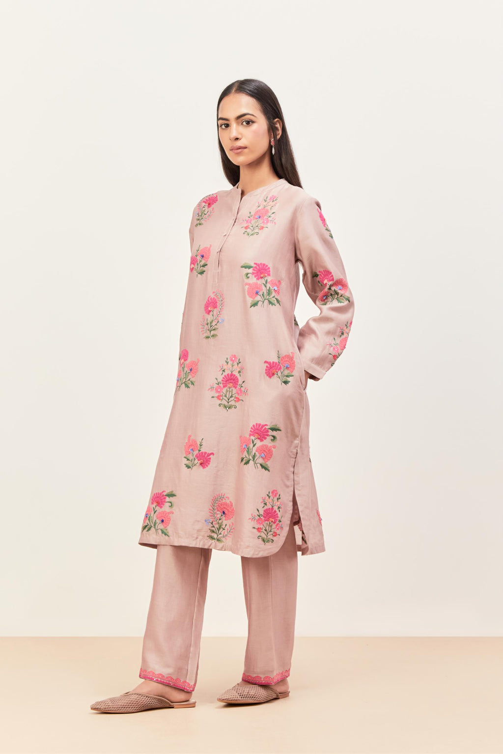 Lilac silk chanderi straight short easy fit kurta set with all-over assorted flower applique, highlighted with aari threadwork & sequins.