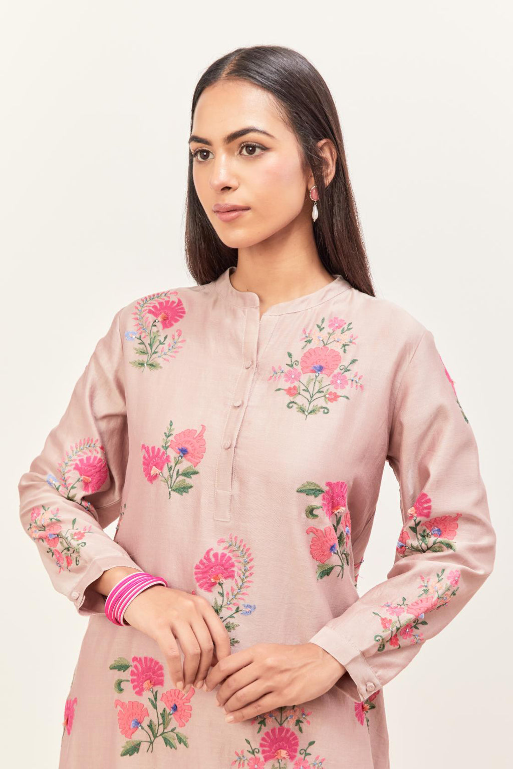 Lilac silk chanderi straight short easy fit kurta set with all-over assorted flower applique, highlighted with aari threadwork & sequins.