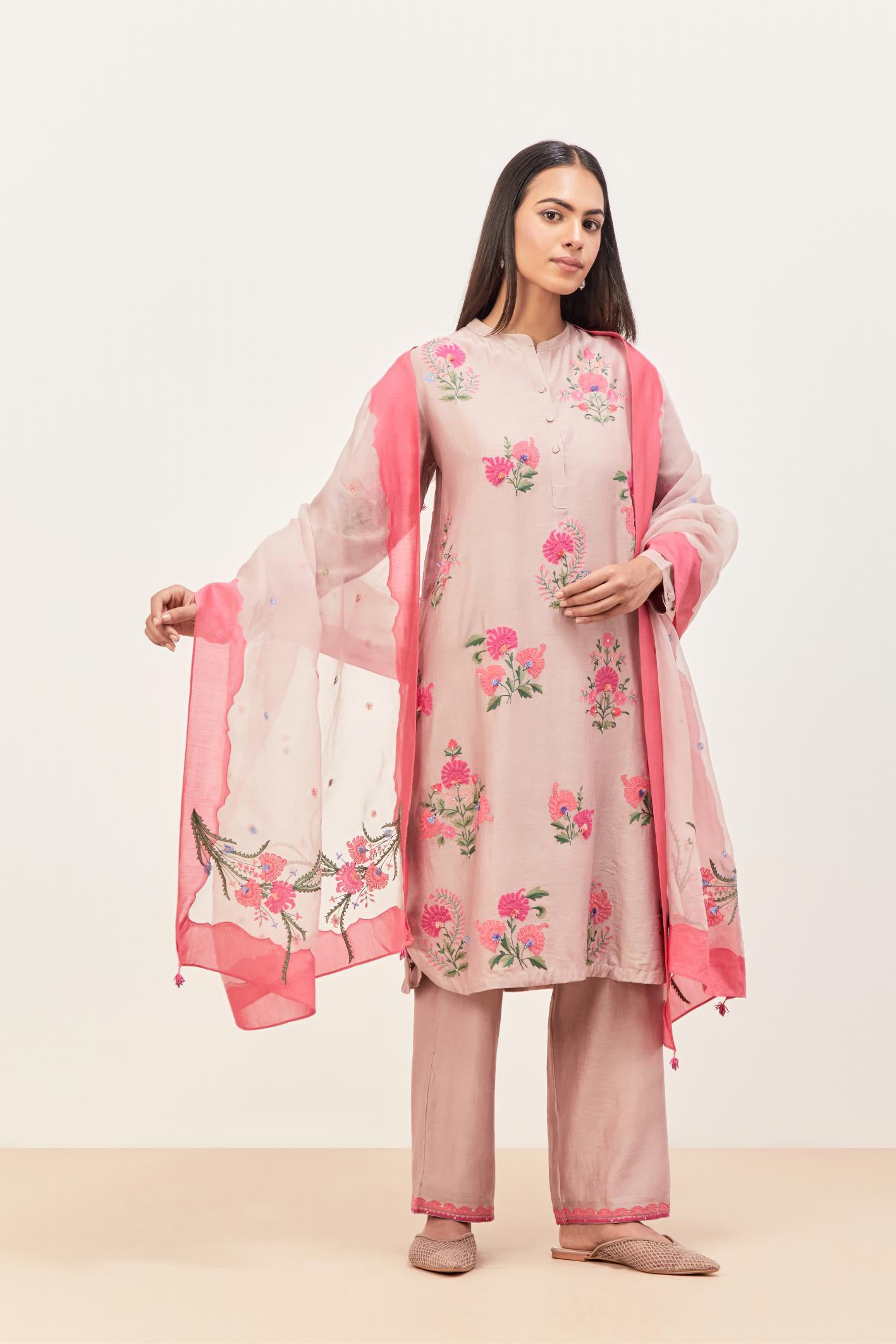 Lilac silk chanderi straight short easy fit kurta set with all-over assorted flower applique, highlighted with aari threadwork & sequins.