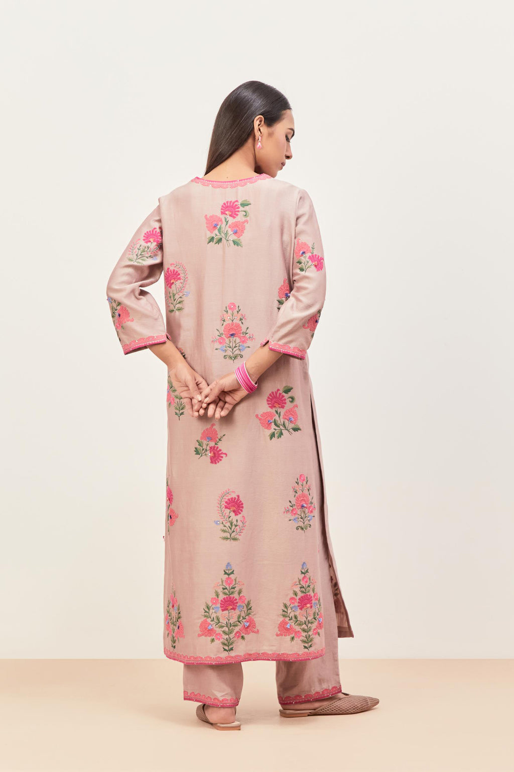 Lilac silk chanderi straight kurta set with all-randomly placed appliqued assorted bootas, highlighted with aari threadwork & sequins.