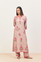 Lilac silk chanderi straight kurta set with all-randomly placed appliqued assorted bootas, highlighted with aari threadwork & sequins.