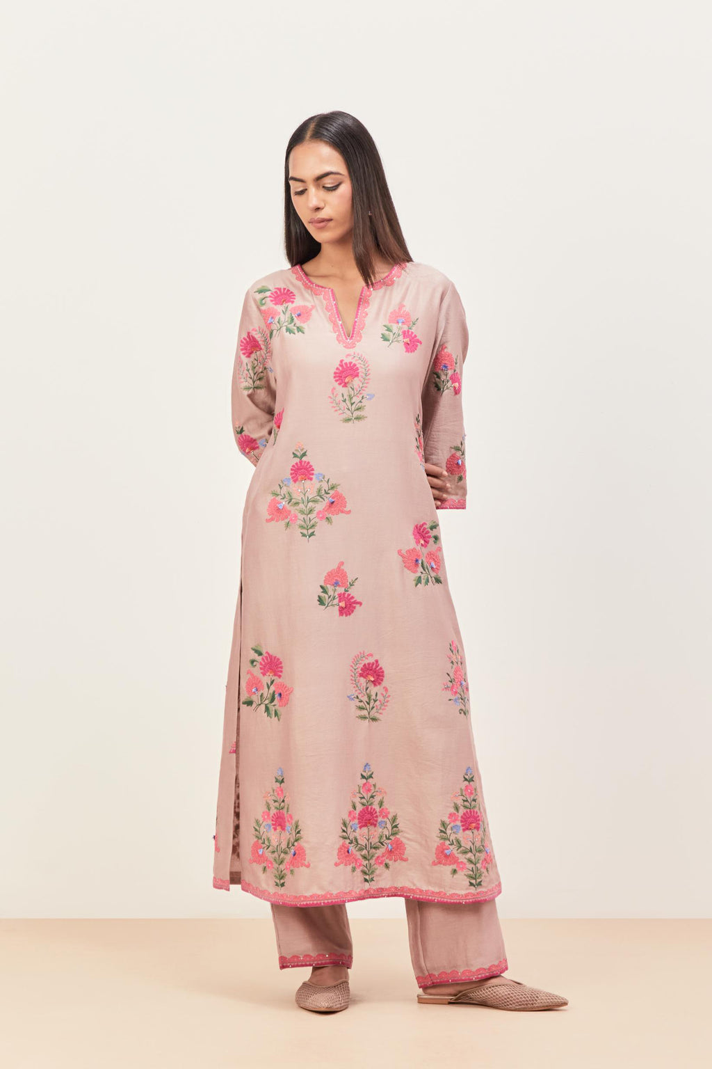 Lilac silk chanderi straight kurta set with all-randomly placed appliqued assorted bootas, highlighted with aari threadwork & sequins.