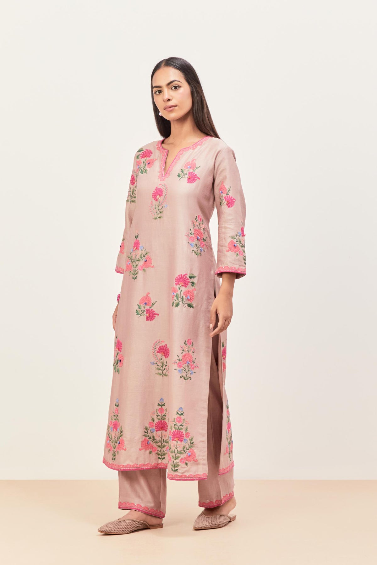 Lilac silk chanderi straight kurta set with all-randomly placed appliqued assorted bootas, highlighted with aari threadwork & sequins.
