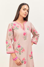 Lilac silk chanderi straight kurta set with all-randomly placed appliqued assorted bootas, highlighted with aari threadwork & sequins.