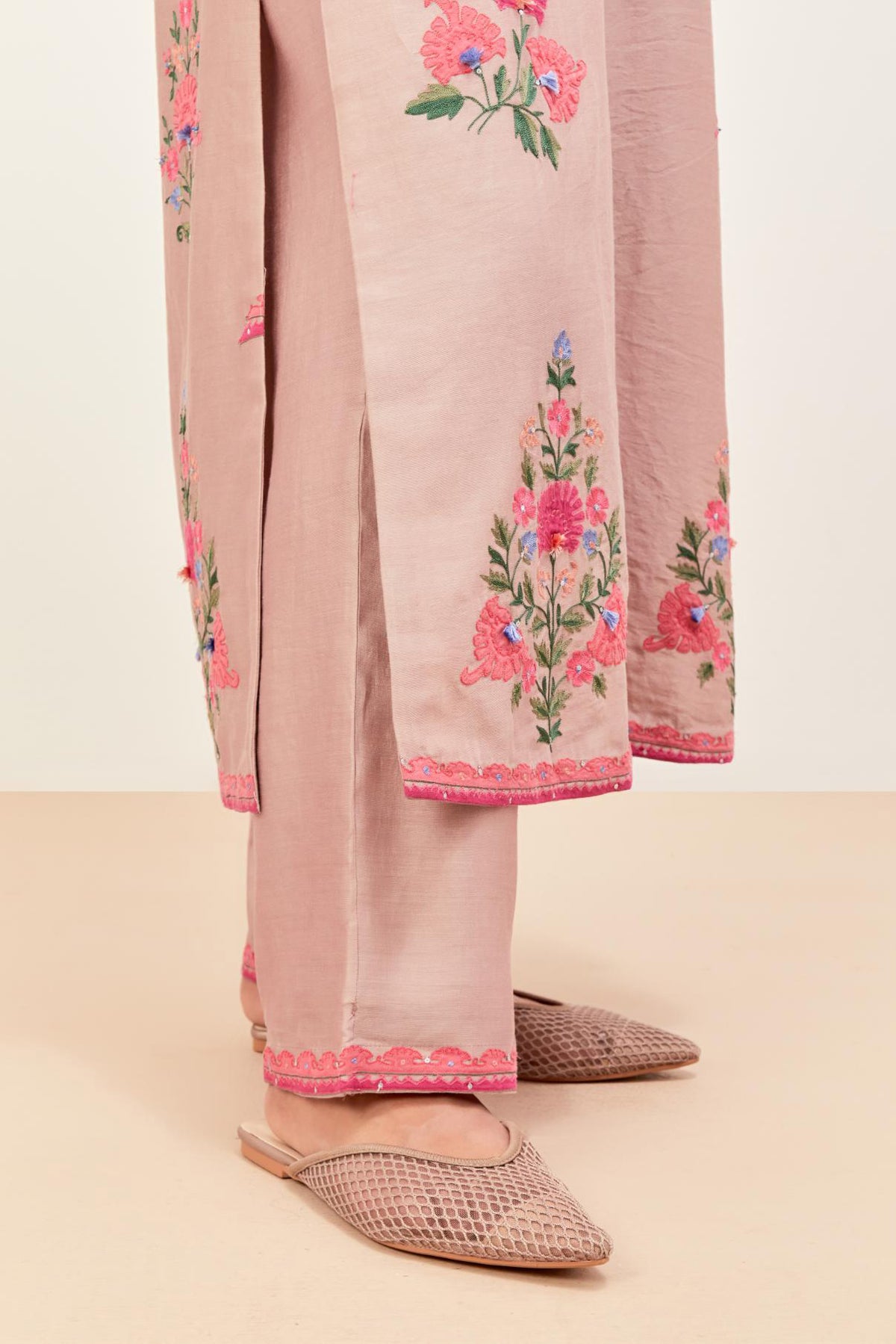 Lilac silk chanderi straight kurta set with all-randomly placed appliqued assorted bootas, highlighted with aari threadwork & sequins.