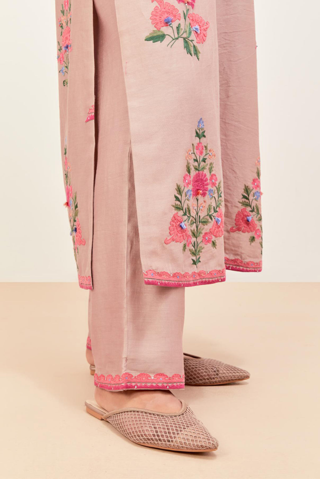Lilac silk chanderi straight kurta set with all-randomly placed appliqued assorted bootas, highlighted with aari threadwork & sequins.