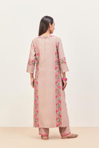 Lilac silk chanderi straight kurta set, decorated with appliqué borders along the side panels, neck and sleeves.