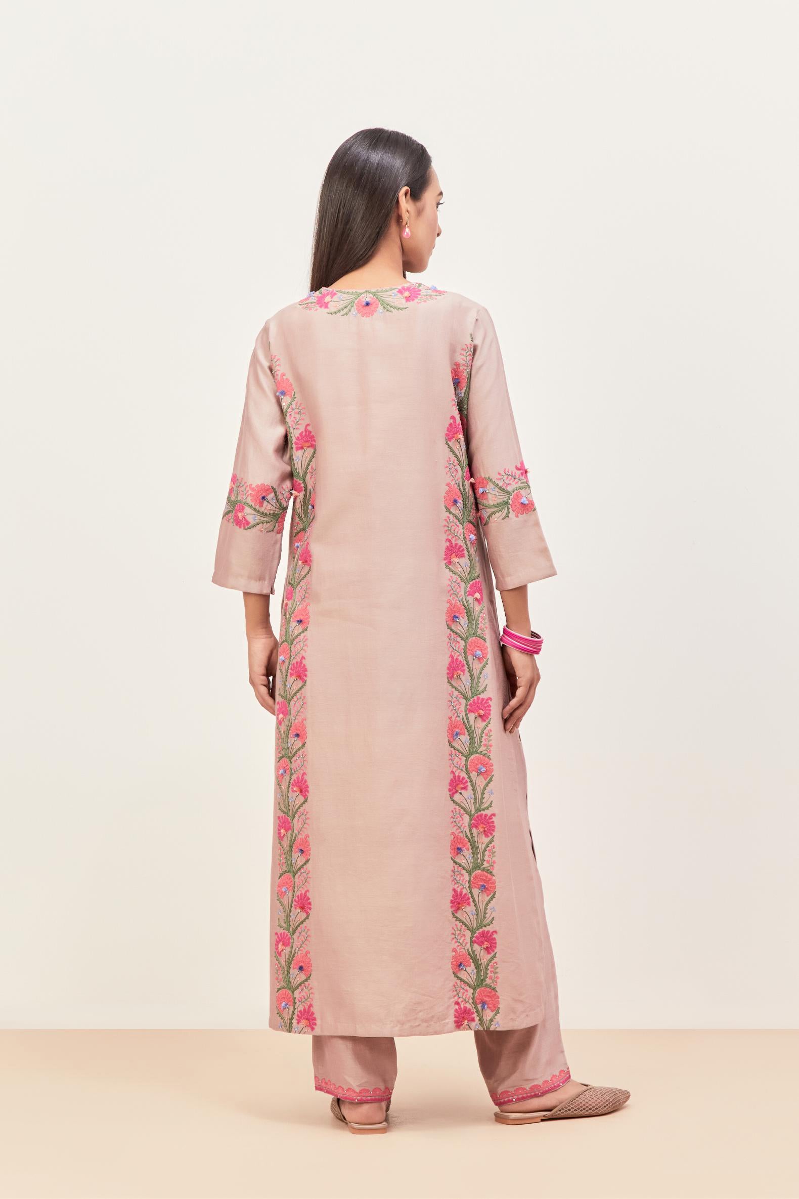 Lilac silk chanderi straight kurta set, decorated with appliqué borders along the side panels, neck and sleeves.