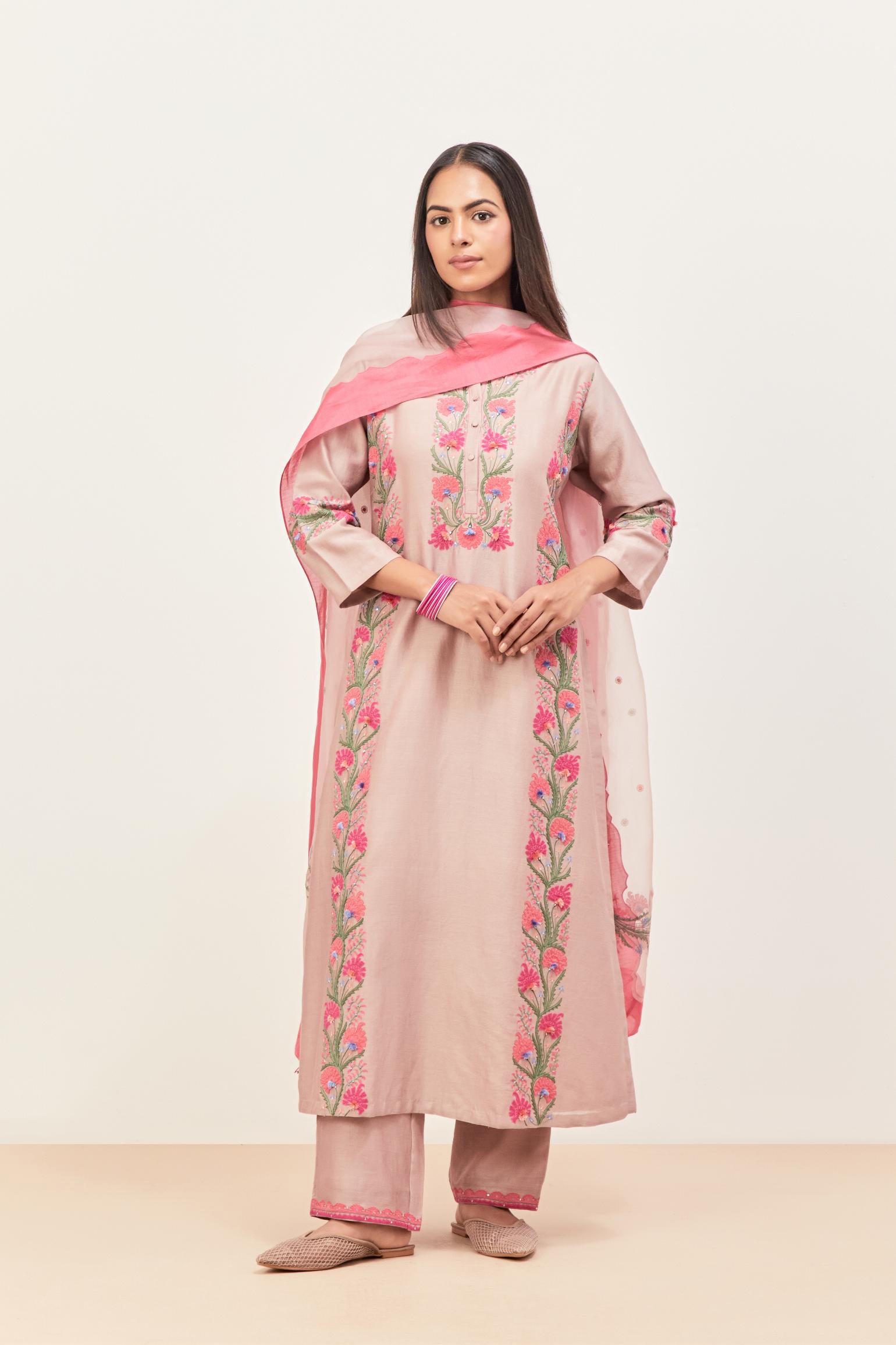 Lilac silk chanderi straight kurta set, decorated with appliqué borders along the side panels, neck and sleeves.