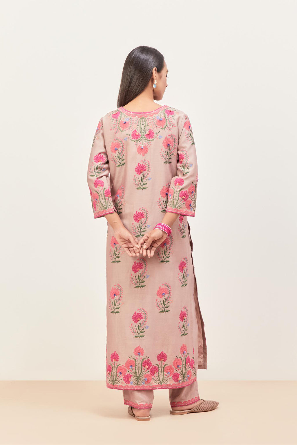 Lilac silk chanderi straight kurta set, decorated with appliqued jaal neckline and hem. The field has symmetrically placed bootas.
