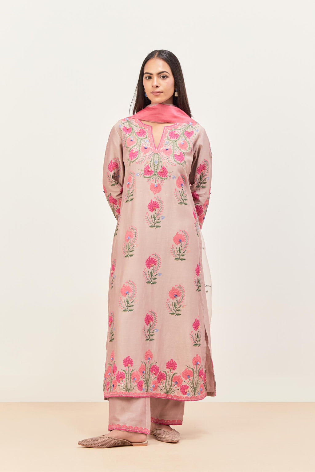 Lilac silk chanderi straight kurta set, decorated with appliqued jaal neckline and hem. The field has symmetrically placed bootas.