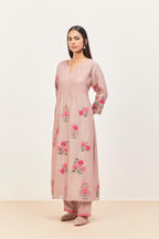 Lilac silk chanderi kurta set with pin tucks at yoke and all-over applique, highlighted with aari threadwork & sequins.