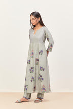 Bluish Grey silk chanderi kurta set with pin tucks at yoke and all-over applique, highlighted with aari threadwork & sequins.