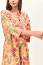 Yellow straight kurta set, fully embroidered with appliqué flowers, multi-colored aari threadwork and silk tassels.