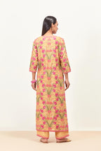 Yellow straight kurta set, fully embroidered with appliqué flowers, multi-colored aari threadwork and silk tassels.