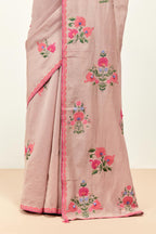 Lilac silk chanderi saree with all-over applique floral boota, highlighted with aari thread work and sequins, paired with lilac silk Chanderi blouse with appliqué work, further enhanced by delicate aari thread embroidery and sequins.