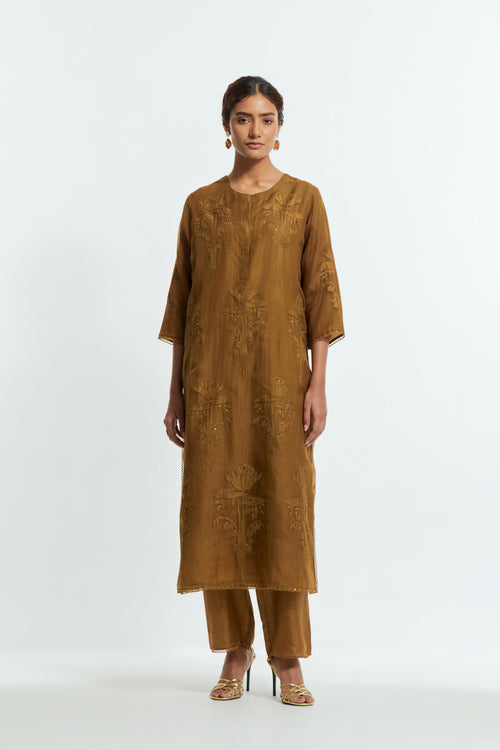 An olive straight silk organza kurta set featuring a round neckline, adorned with delicately placed silk floral boota appliqués and sequin work.