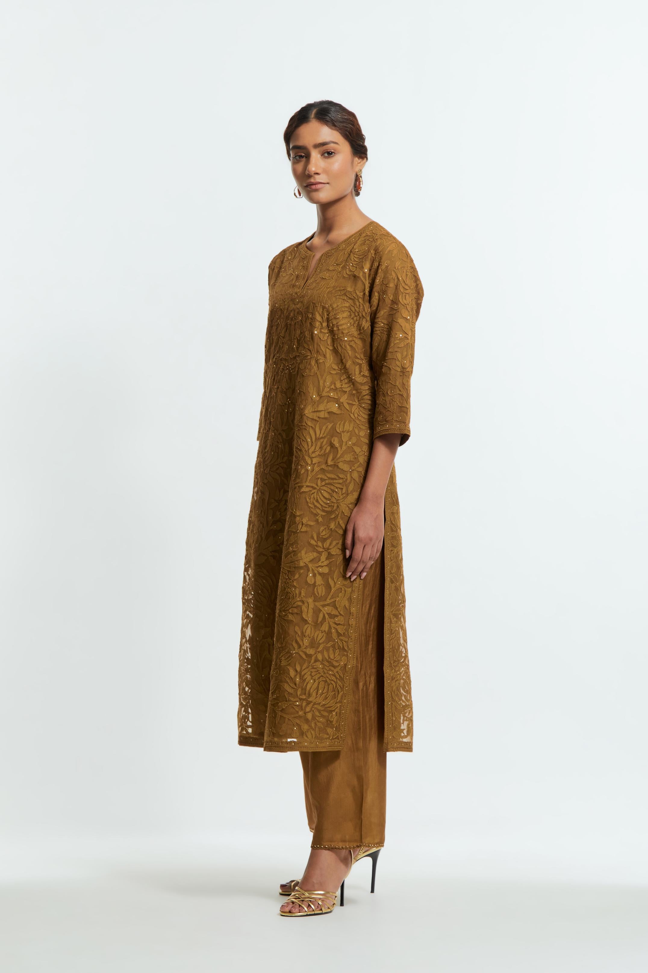 Olive silk organza straight kurta set featuring an all-over silk appliqué trellis jaal, delicately highlighted with subtle sequins.