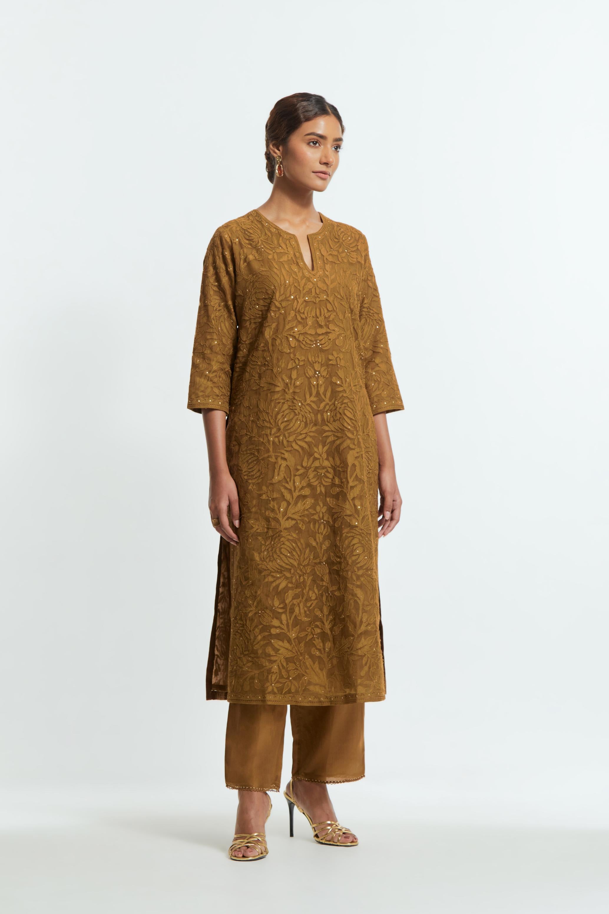 Olive silk organza straight kurta set featuring an all-over silk appliqué trellis jaal, delicately highlighted with subtle sequins.